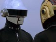 This screengrab shows members of Daft Punk taken from a video titled "Epilogue" posted shared on their YouTube channel.