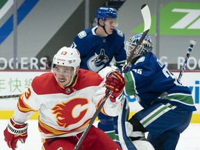 Calgary Flames left wing Johnny Gaudreau celebrates his goal past Vancouver Canucks goaltender Thatcher Demko during third-period NHL action in Vancouver last Thursday.