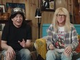 Mike Myers and Dana Carvey reprise their roles from "Wayne's World" for an advertisement that will run during this Sunday's Super Bowl.