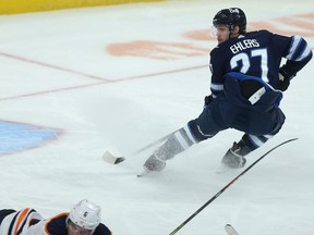 Winnipeg Jets forward Nikolaj Ehlers drives the Edmonton Oilers net in Winnipeg on Tuesday, Jan. 26, 2021.