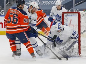 Toronto Maple Leafs goaltender Michael Hutchinson (30) makes a save against Edmonton Oilers forward Kailer Yamamoto (56) during the first period at Rogers Place.