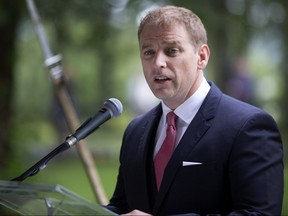 Premier of Newfoundland and Labrador Dr. Andrew Furey addresses the audience following the swearing-in ceremony on the grounds of Government House in St. John's on August 19, 2020.