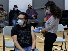 An image posted to Twitter by NDP MPP Sol Mamakwa of him receiving the Moderna COVID-19 vaccine at Sandy Lake First Nation on March 1, 2021.