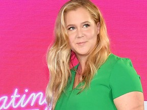 Amy Schumer walks onstage at the #BlogHer18 Creators Summit at Pier 17 on August 8, 2018 in New York City.