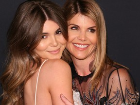 Olivia Jade, left, and Lori Loughlin attend the Women's Cancer Research Fund's 'Unforgettable Evening' in Los Angeles, Calif., on Feb. 27, 2018.