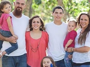 Jessica Woodruff, 45, and Jake Woodruff, 36, are seen with their children in an image posted to GoFundMe.