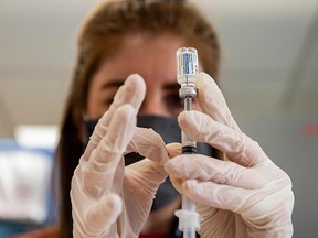 Home base primary care Pharmacist Erin Edmonds fills five syringes with the Johnson & Johnson Covid-19 Janssen Vaccine in Boston, Massachusetts on March 4, 2021.