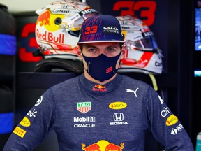 Max Verstappen of Netherlands and Red Bull Racing looks on in the garage during qualifying ahead of the F1 Grand Prix of Bahrain at Bahrain International Circuit on March 27, 2021 in Bahrain.