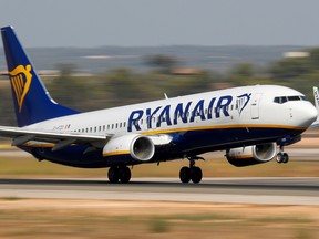 A Ryanair Boeing 737-800 airplane takes off from the airport in Palma de Mallorca, Spain, July 29, 2018.