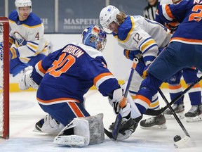 Buffalo Sabres centre Eric Staal (12) tries to shoot the puck against New York Islanders goalie Ilya Sorokin during NHL action at Nassau Veterans Memorial Coliseum on March 4.