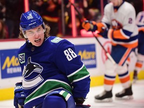 Canucks forward Adam Gaudette celebrates the final goal he scored in front of a full house of fans on March 10, 2020 against the visiting New York Islanders. Two days later the NHL was put on hold because of the COVID-19 pandemic.