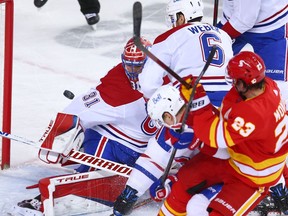 Calgary Flames forward Sean Monahan scores on Montreal Canadiens goaltender Carey Price during NHL action at the Scotiabank Saddledome in Calgary on Saturday. It was Monahan's second goal of the night.