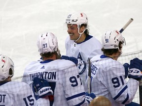 Auston Matthews of the Toronto Maple Leafs celebrates after scoring during the second period at the Saddledome in Calgary on Monday.