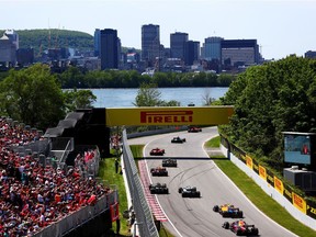 Sebastian Vettel of Germany driving the (5) Scuderia Ferrari SF90 leads the field including Pierre Gasly of France and Red Bull Racing and Max Verstappen of Netherlands and Red Bull Racing during the F1 Grand Prix of Canada at Circuit Gilles Villeneuve on June 9, 2019 in Montreal.