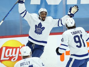 Toronto Maple Leafs forward Wayne Simmonds (left) celebrates his goal against the Winnipeg Jets with John Tavares (right) on Thursday night.