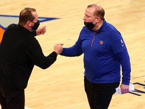 Head coaches Nick Nurse of the Toronto Raptors and Tom Thibodeau of the New York Knicks shake hands after their game earlier this month.