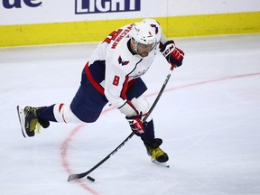 Washington Capitals star Alex Ovechkin takes a shot against the Philadelphia Flyers on Saturday. Ovechkin scored twice in the game and is now just one goal behind tying Marcel Dionne for fifth overall on the all-time NHL scoring list at 731.