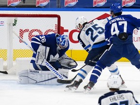 Winnipeg Jets' Paul Stastny tries to get a rebound from Maple Leafs goaltender Jack Campbell during the first period at Scotiabank Arena on Thursday, April 15, 2021.