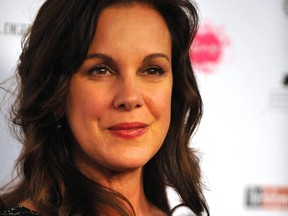 Actress Elizabeth Perkins arrives for the 61st Primetime Emmy Awards outstanding performance nominees reception in West Hollywood, Calif. on Sept. 17, 2009.