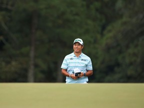 Hideki Matsuyama of Japan walks to the 18th green during the third round of the Masters at Augusta National Golf Club on April 10, 2021 in Augusta, Ga.