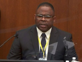 Sgt. Jody Stiger of the Los Angeles Police Department answers questions during the eighth day of the trial of former Minneapolis police officer Derek Chauvin for second-degree murder, third-degree murder and second-degree manslaughter in the death of George Floyd in Minneapolis, Minn., April 7, 2021 in a still image from video.