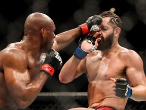 Kamaru Usman of Nigeria (left) punches Jorge Masvidal of the U.S. (right) during the Welterweight Title bout of UFC 261 at VyStar Veterans Memorial Arena in Jacksonville, Fla., Saturday, April 25, 2021.