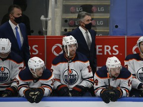 Edmonton Oilers coach Dave Tippett mans the bench against the Toronto Maple Leafs on Jan. 22, 2021.