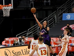 Raptors' Malachi Flynn lays one up during the second quarter against the Atlanta Hawks at Amalie Arena in Tampa, Fla., on Tuesday, April 13, 2021.