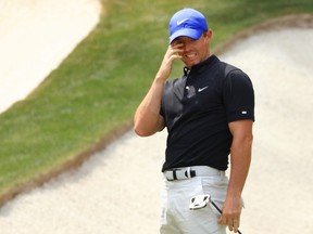 Rory McIlroy of Northern Ireland reacts after missing a putt on the 13th green during the first round of the Masters at Augusta National Golf Club on April 8, 2021 in Augusta, Ga.