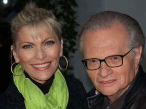 In this file photo takenMay 14, 2003, TV and radio interviewer Larry King and his wife Shawn Southwick arrive for the premiere of "Bruce Almighty" at Universal Citywalk in Los Angeles.