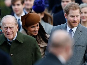 In this file photo taken on December 25, 2017 (L-R) Britain's Prince Philip, Duke of Edinburgh, US actress and fiancee of Britain's Prince Harry Meghan Markle and Britain's Prince Harry (R) arrive to attend the Royal Family's traditional Christmas Day church service at St Mary Magdalene Church in Sandringham, Norfolk, eastern England.