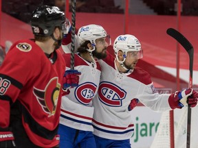 Senators goalie Filip Gustavsson squares up to stop a shot by Canadiens winger Michael Frolik during first period in Ottawa Thursday night.