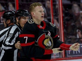 Ottawa Senators left wing Brady Tkachuk (7) heads to the penalty box after fighting with Vancouver Canucks centre Zack MacEwen (71) during first-period NHL action at the Canadian Tire Centre on Wednesday, April 28, 2021.