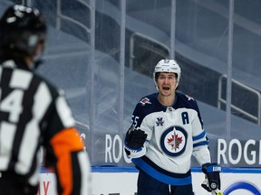 Winnipeg Jets’ Mark Scheifele pleads his case as he’s called for a penalty.