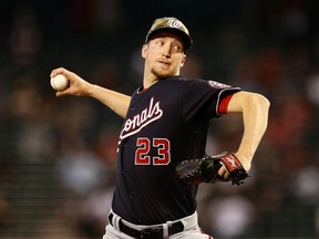 Starting pitcher Erick Fedde of the Washington Nationals pitches against the Arizona Diamondbacks during the first inning of the MLB game at Chase Field on May 16, 2021 in Phoenix, Arizona.