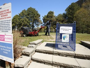 City of Toronto groundskeepers work April 26, 2021 at Dentonia public golf course, which remains closed to the public April 26, 2021.