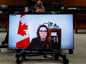 Katie Telford, Chief of Staff to Canada's Prime Minister Justin Trudeau, appears on a screen as she attends a House of Commons defence committee meeting on sexual misconduct in the armed forces, in Ottawa, May 7, 2021.