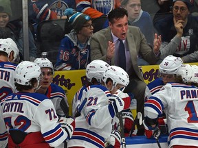 New York Rangers head coach David Quinn called a time-out to talk to his players after the third goal was scored by the Edmonton Oilers in the first period during NHL action at Rogers Place in Edmonton, December 31, 2019.