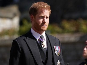 Prince Harry arrives for the funeral of Prince Philip in Windsor, England.