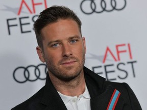 In this file photo taken on November 08, 2018 Actor Armie Hammer arrives for the AFI Opening Night World Premiere Gala Screening of "On the Basis of Sex" at the TCL Chinese theatre in Hollywood.