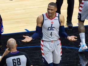 Washington Wizards guard Russell Westbrook (4) argues a call with referee Jacyn Goble (68) during the fourth quarter of game two against the Philadelphia 76ers in the first round of the 2021 NBA Playoffs at Wells Fargo Center.