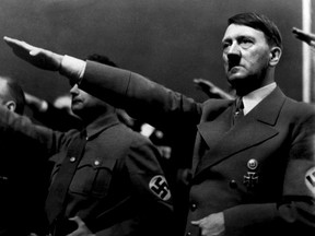 A picture dated 1939 shows German Nazi Chancellor Adolf Hitler giving the nazi salute during a rally next to "Deputy Furhrer" Rudolf Hess.