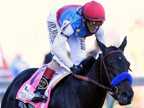 John Velazquez guides Medina Spirit to win the 147th running of the Kentucky Derby at Churchill Downs.