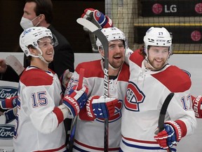Montreal Canadiens forwards Jesperi Kotkaniemi (15) and Josh Anderson (17) and defenceman Erik Gustafsson (32) celebrate as they defeat the Toronto Maple Leafs in Game 7 of the first round of the 2021 Stanley Cup Playoffs at Scotiabank Arena in Toronto on Monday, May 31, 2021.