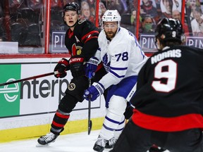 Ottawa Senators left wing Brady Tkachuk (7) and Toronto Maple Leafs defenceman T.J. Brodie keep their eyes on the puck in the first period on May 12, 2021.