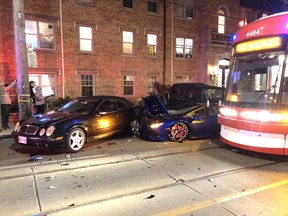 A Lamborghini, a Mercedes and a Jeep were damaged along with a TTC streetcar in a collision in the Queen St. E. and Maclean Ave. area of Toronto on Wednesday, May 12, 2021.