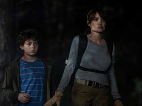 Finn Little and Angelina Jolie star in Warner Bros. Pictures' "Those Who Wish Me Dead."