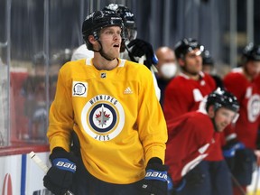 Nikolaj Ehlers reacts to a teammate during Winnipeg Jets practice in Winnipeg on Tuesday, May 18, 2021.