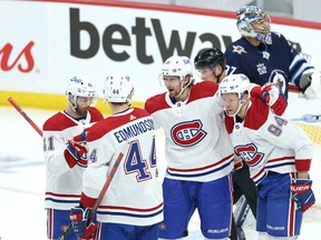 Montreal Canadiens centre Eric Staal (centre) celebrates his goal during Game 1 of the North Division final against the Winnipeg Jets in Winnipeg on Tuesday