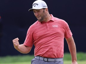 Jon Rahm of Spain celebrates making a putt for birdie on the 18th green during the final round of the 2021 U.S. Open at Torrey Pines Golf Course (South Course) on Sunday.